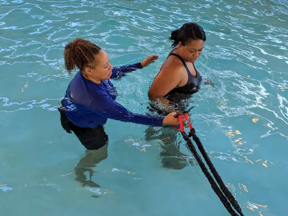 Two women training in water