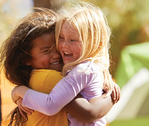 two children hugging